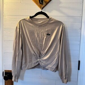 Van’s long sleeve shirt. Tan with black lettering.